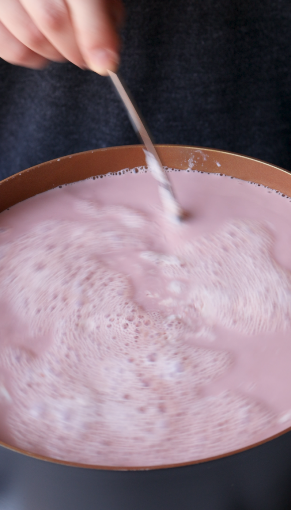 tea going into boiling milk